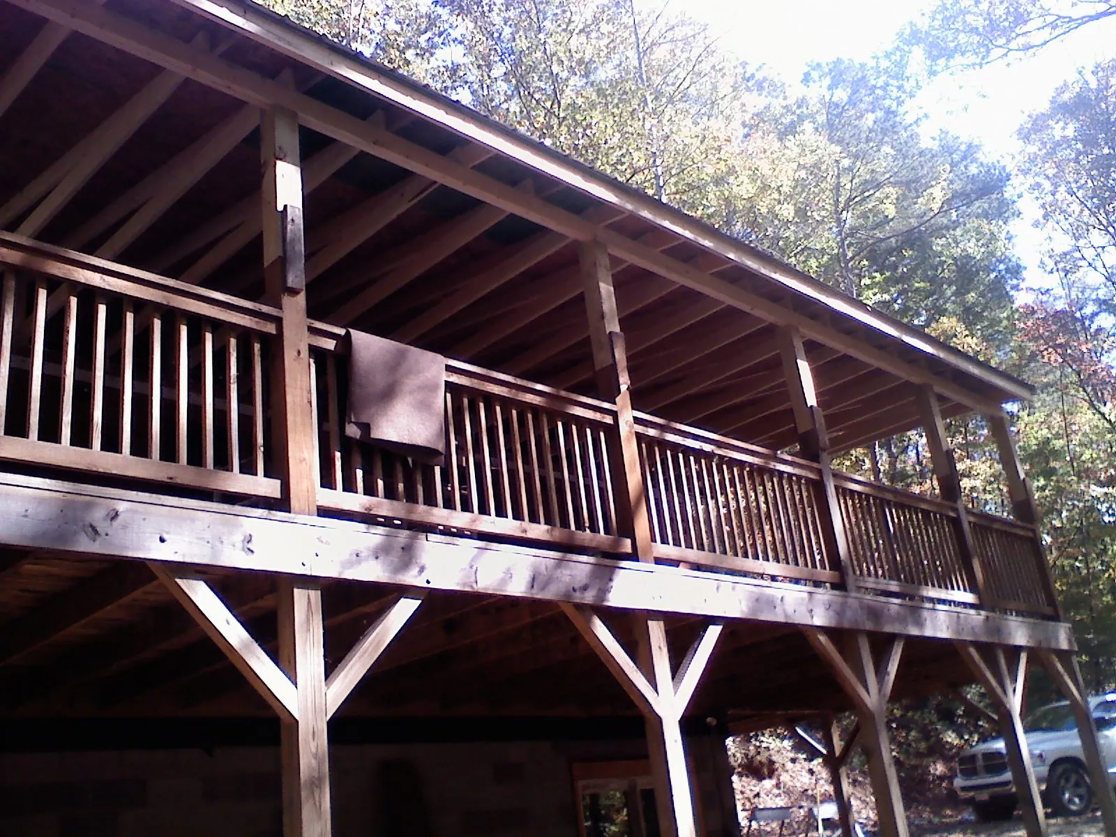 Timber framing under a new elevated porch and deck — Roof Leak Repair in Cummington by Roofing Brothers